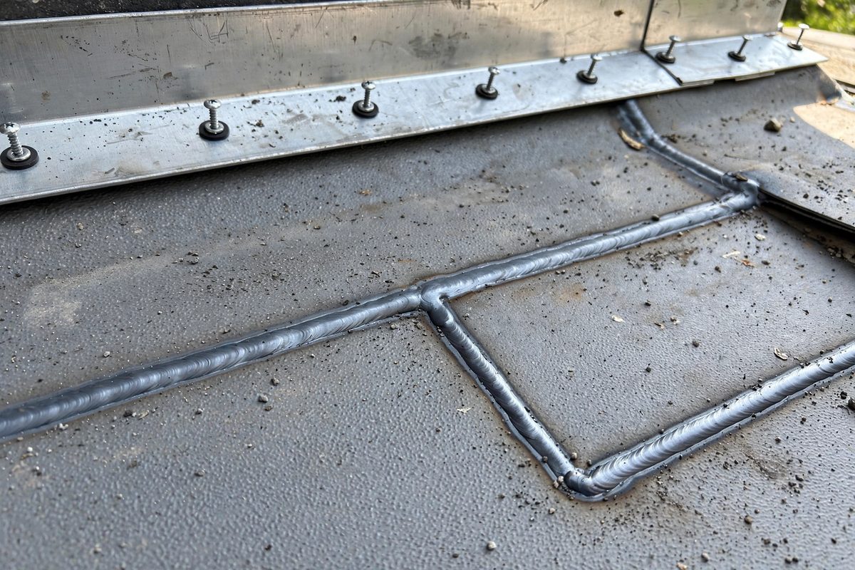 Sealed seams and flashing from professional commercial roof repairs
